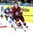 MINSK, BELARUS - MAY 10: Latvia's Kristaps Sotnieks #11 chases down a loose puck while Finland's Pekka Jormakka #25 defends during preliminary round action at the 2014 IIHF Ice Hockey World Championship. (Photo by Andre Ringuette/HHOF-IIHF Images)

